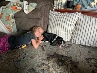 Joel Ackerman with their basset hound